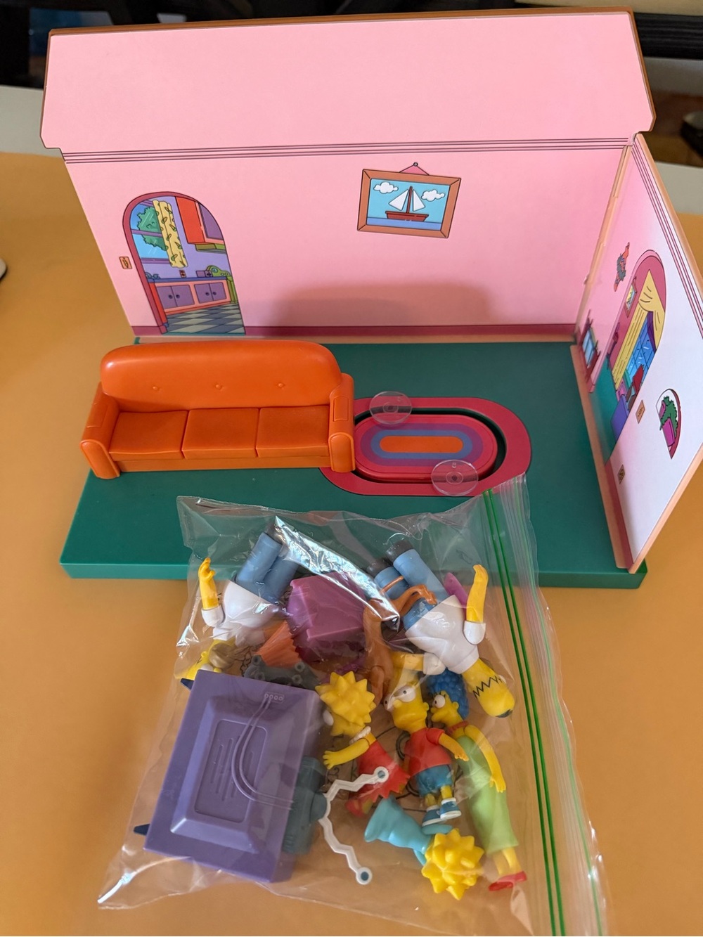 Simpsons house with figures